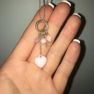 Silver necklace with pink heart